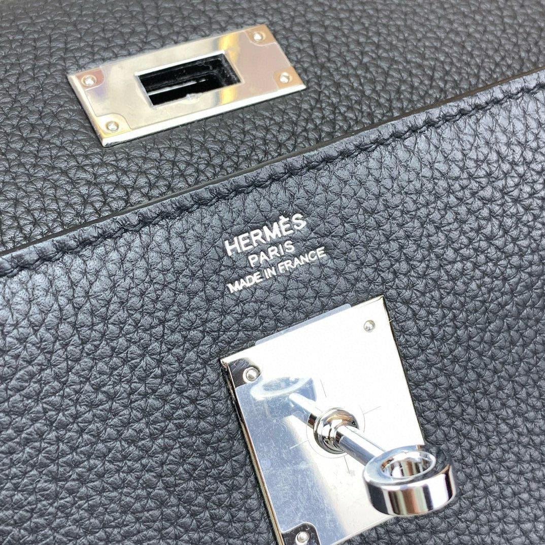HERM KELLY MESSENGER 25