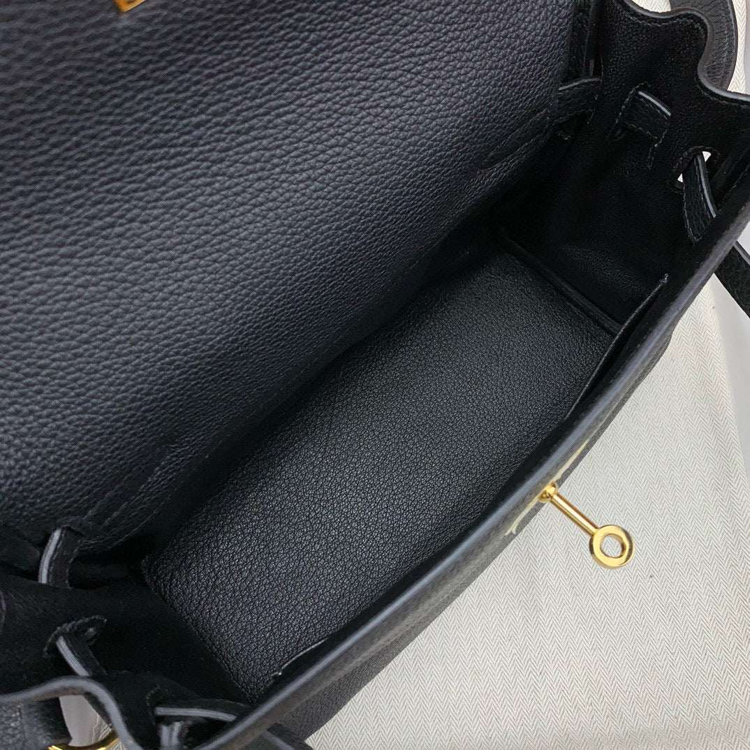 HERM KELLY MESSENGER 25
