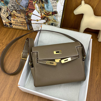 HERM KELLY MESSENGER 25