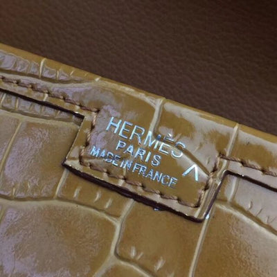 HERM Jige Elan 29 Clutch In Camarel Crocodile Leather