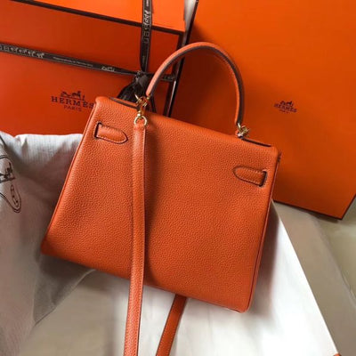 HERM Kelly 25cm Retourne Bag In Orange Clemence Leather