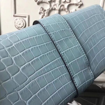 HERM Medor Clutch Bag In Ciel Crocodile Leather