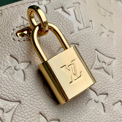ANYTIME MM 42 IN TOURTERELLE GRAY MONOGRAM EMPREINTE CALFSKIN GOLD HARDWARE