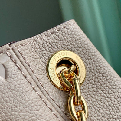 ANYTIME MM 42 IN TOURTERELLE GRAY MONOGRAM EMPREINTE CALFSKIN GOLD HARDWARE
